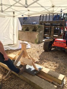 One of the many stones being placed on the external support